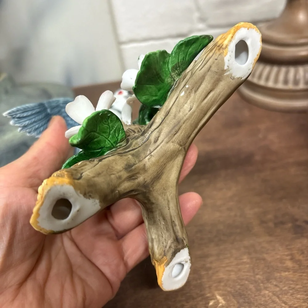 Decorative Bird Figurine with Green Leaves